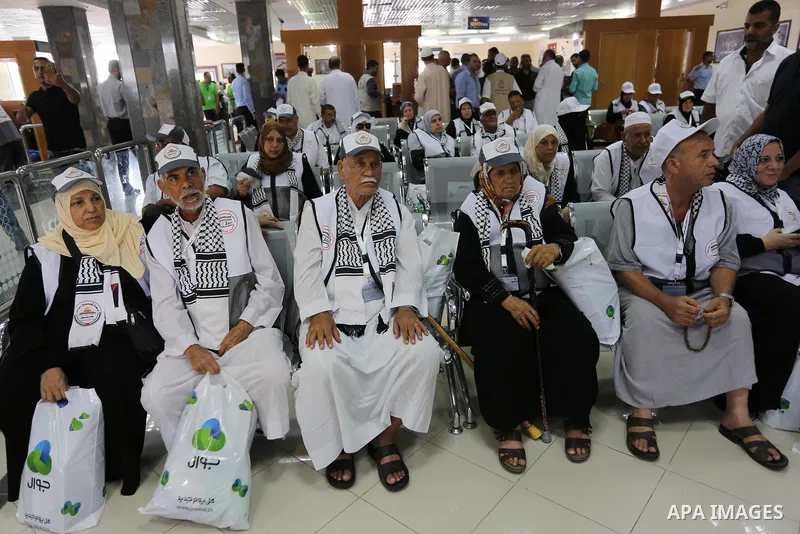 Palestinian Muslim pilgrims arrive at the Rafah border crossing between Egypt and the southern Gaza Strip, on August 14, 2017, ahead of their departure to the annual Hajj pilgrimage in Saudi Arabia's holy city of Mecca....