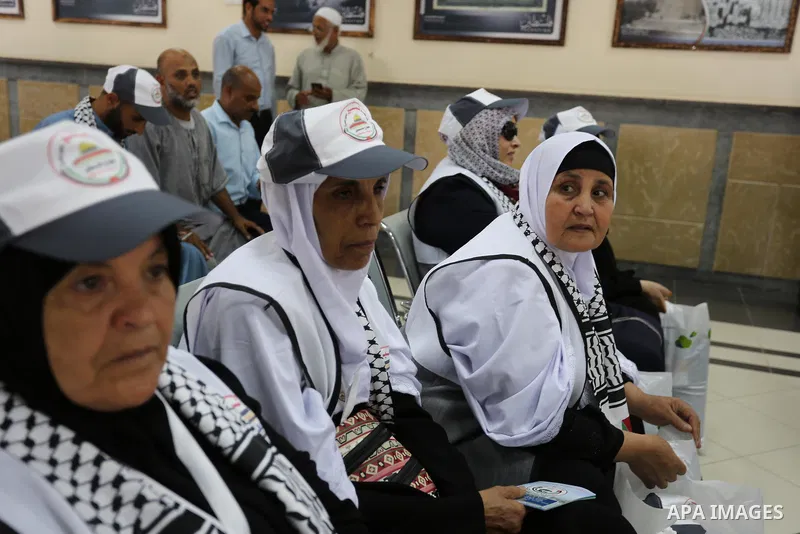 Palestinian Muslim pilgrims arrive at the Rafah border crossing between Egypt and the southern Gaza Strip, on August 14, 2017, ahead of their departure to the annual Hajj pilgrimage in Saudi Arabia's holy city of Mecca....