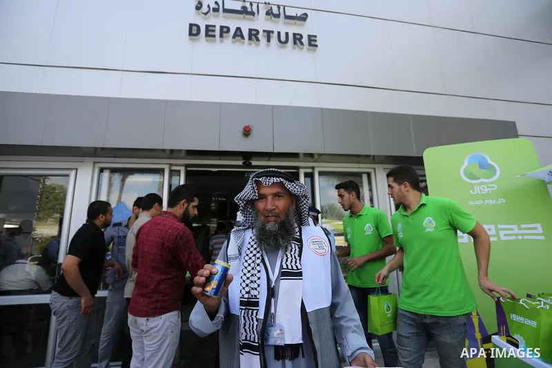 Palestinian Muslim pilgrims arrive at the Rafah border crossing between Egypt and the southern Gaza Strip, on August 14, 2017, ahead of their departure to the annual Hajj pilgrimage in Saudi Arabia's holy city of Mecca....