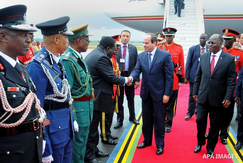 Egyptian President Abdel Fattah al-Sisi is received by Tanzania's President John Magufuli at the Julius Nyerere International Airport in Dar es Salaam, Tanzania August 14, 2017. Photo by Egyptian President Office