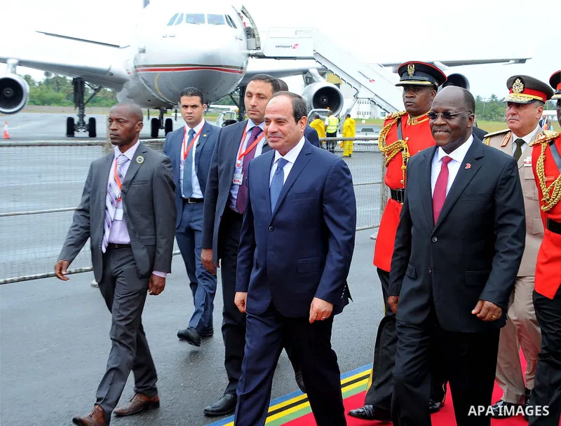 Egyptian President Abdel Fattah al-Sisi walks alongside of Tanzania's President John Magufuli upon arriving at the Julius Nyerere International Airport in Dar es Salaam, Tanzania August 14, 2017. Photo by Egyptian Presid...