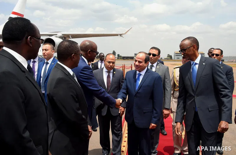 Egyptian President Abdel Fattah al-Sisi attends the welcome ceremony after his arrival at Kigali International Airport on August 15, 2017. The Egyptian President is paying a two day visit to Rwanda. Photo by Egyptian Pre...