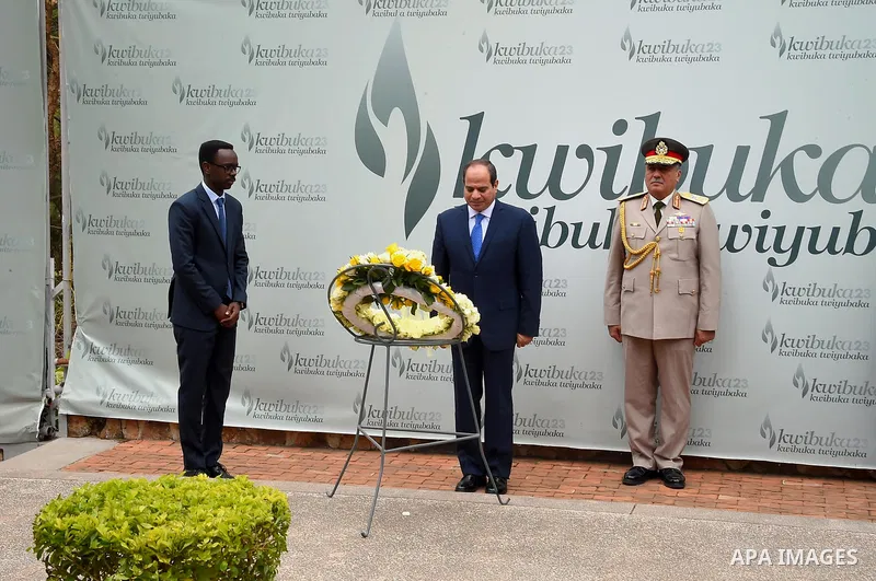 Egyptian President Abdel Fattah al-Sisi lays a wreath at The Kigali Genocide Memorial in Kigali on August 15, 2017, shortly after his arrival for a visit. The Egyptian President is paying a two day visit to Rwanda. Photo...