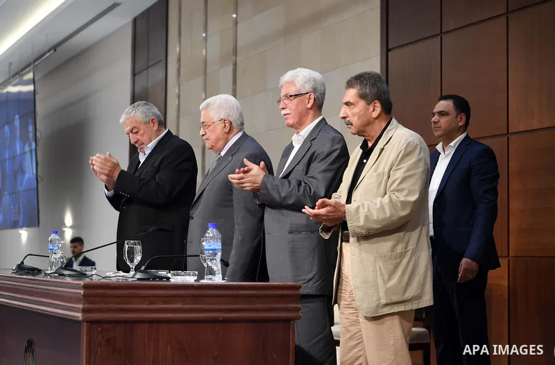 Palestinian President Mahmoud Abbas meets with members of the territories of the Fatah movement, in the West Bank city of Ramallah, on August 15, 2017. Photo by Thaer Ganaim