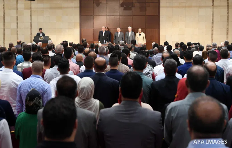 Palestinian President Mahmoud Abbas meets with members of the territories of the Fatah movement, in the West Bank city of Ramallah, on August 15, 2017. Photo by Thaer Ganaim