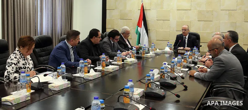 Palestinian Prime Minister, Rami hamdallah, chairs Meeting of the Crisis Plan and Challenges Committee, in the West Bank city of Ramallah on August 16, 2017. Photo by Prime Minister Office
