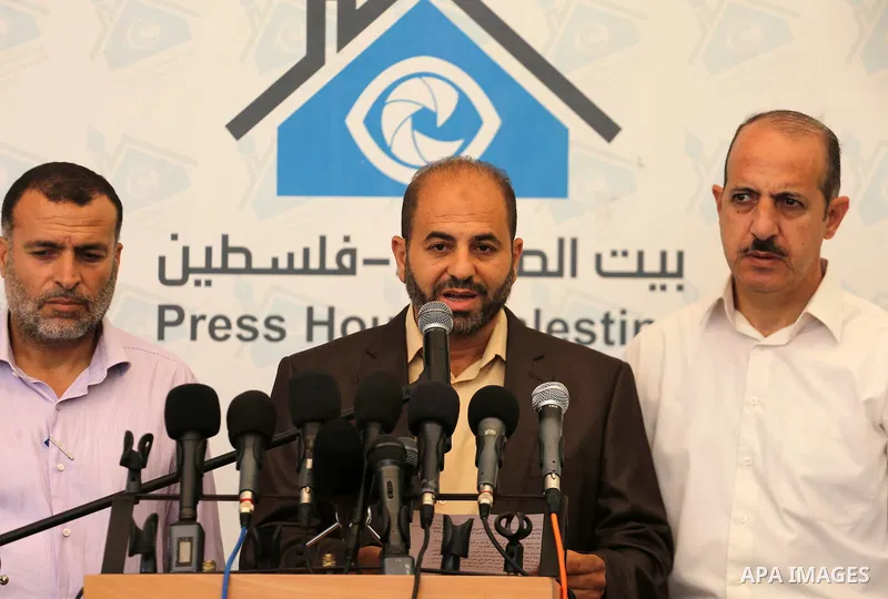 Head of the Popular Committee Moeen Abu Aoukal speaks during a press conference, in Gaza city, on August 16, 2017. Photo by Mohammed Asad