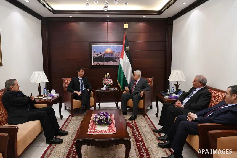 Palestinian President Mahmoud Abbas meets with a head of Denmark representation office, at his headquarter, in the West Bank city of Ramallah, on August 16, 2017. Photo by Thaer Ganaim