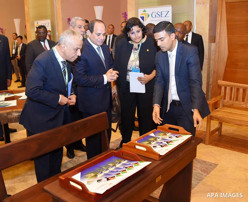 Egyptian President Abdel Fattah al-Sisi and Gabon's President Ali Bongo visit Gabonese wood exhibition in Libreville on August 16, 2017. Photo by Egyptian President Office