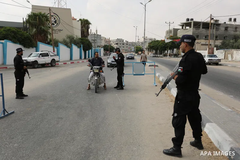Palestinian policemen stop a vehicle at a security checkpoint, in Rafah in the southern of Gaza Strip August 17, 2017. A suicide bomber killed a Palestinian security man in southern Gaza, officials said, in what was seen...