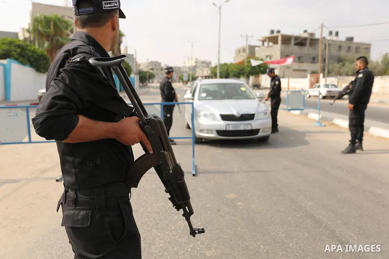 Palestinian policemen stop a vehicle at a security checkpoint, in Rafah in the southern of Gaza Strip August 17, 2017. A suicide bomber killed a Palestinian security man in southern Gaza, officials said, in what was seen...