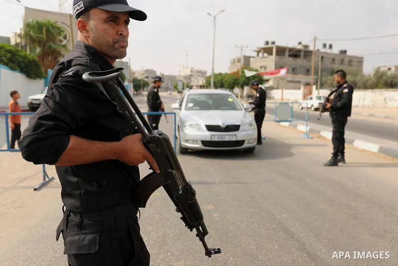 Palestinian policemen stop a vehicle at a security checkpoint, in Rafah in the southern of Gaza Strip August 17, 2017. A suicide bomber killed a Palestinian security man in southern Gaza, officials said, in what was seen...