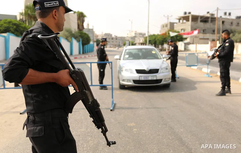 Palestinian policemen stop a vehicle at a security checkpoint, in Rafah in the southern of Gaza Strip August 17, 2017. A suicide bomber killed a Palestinian security man in southern Gaza, officials said, in what was seen...