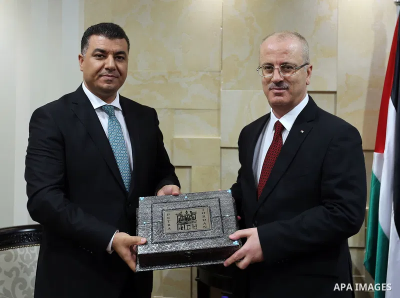 Palestinian Prime minister, Rami Hamadallah, meets with a Jordanian Minister of Agriculture Khalid Al Hanifat, in the West Bank city of Ramallah,on August 17, 2017. Photo by Prime Minister Office