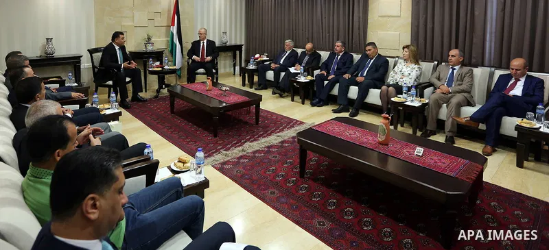 Palestinian Prime minister, Rami Hamadallah, meets with a Jordanian Minister of Agriculture Khalid Al Hanifat, in the West Bank city of Ramallah,on August 17, 2017. Photo by Prime Minister Office