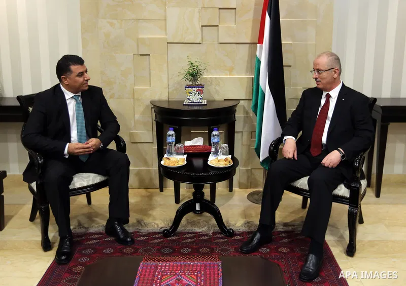 Palestinian Prime minister, Rami Hamadallah, meets with a Jordanian Minister of Agriculture Khalid Al Hanifat, in the West Bank city of Ramallah,on August 17, 2017. Photo by Prime Minister Office