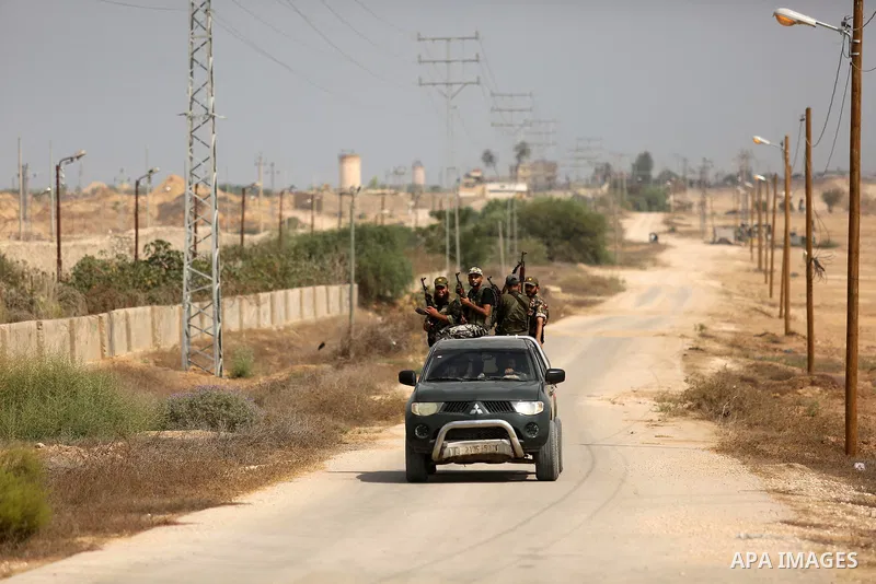 Palestinian policemen patrol on the border with Egypt, in Rafah in the southern of Gaza Strip August 17, 2017. A suicide bomber killed a Palestinian security man in southern Gaza, officials said, in what was seen as a ra...