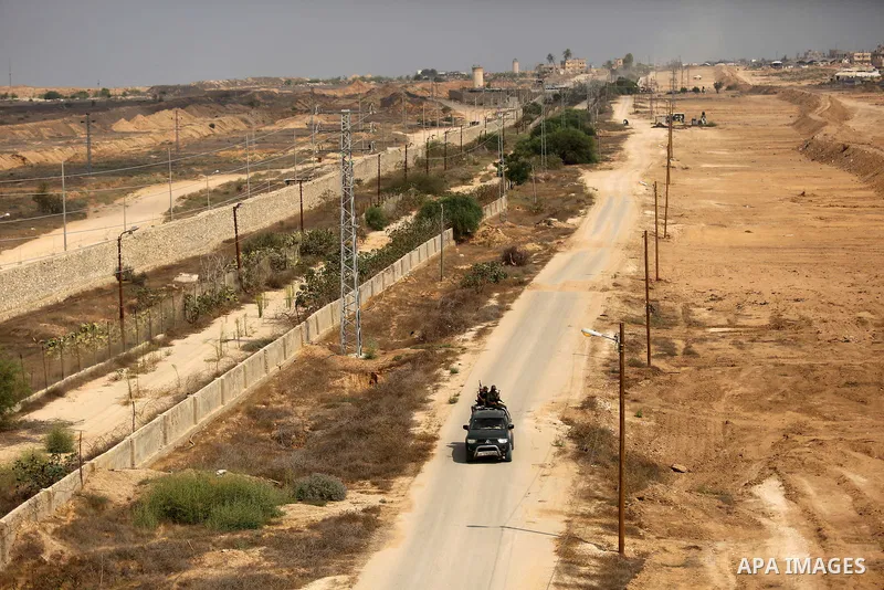 Palestinian policemen patrol on the border with Egypt, in Rafah in the southern of Gaza Strip August 17, 2017. A suicide bomber killed a Palestinian security man in southern Gaza, officials said, in what was seen as a ra...