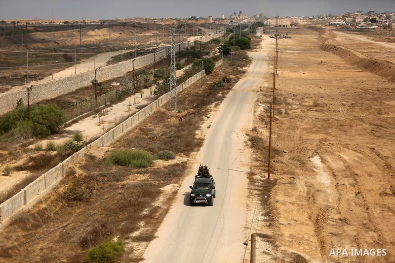 Palestinian policemen patrol on the border with Egypt, in Rafah in the southern of Gaza Strip August 17, 2017. A suicide bomber killed a Palestinian security man in southern Gaza, officials said, in what was seen as a ra...