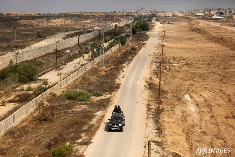 Palestinian policemen patrol on the border with Egypt, in Rafah in the southern of Gaza Strip August 17, 2017. A suicide bomber killed a Palestinian security man in southern Gaza, officials said, in what was seen as a ra...