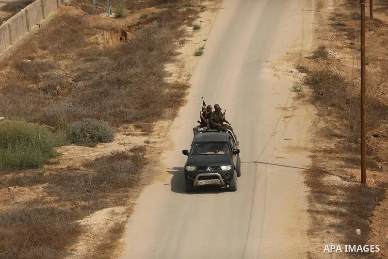 Palestinian policemen patrol on the border with Egypt, in Rafah in the southern of Gaza Strip August 17, 2017. A suicide bomber killed a Palestinian security man in southern Gaza, officials said, in what was seen as a ra...
