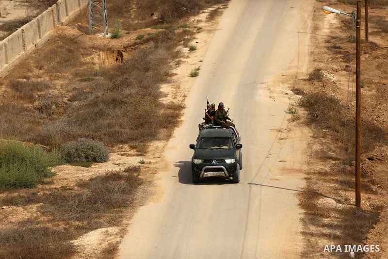 Palestinian policemen patrol on the border with Egypt, in Rafah in the southern of Gaza Strip August 17, 2017. A suicide bomber killed a Palestinian security man in southern Gaza, officials said, in what was seen as a ra...