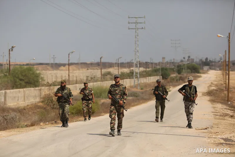 Palestinian policemen patrol on the border with Egypt, in Rafah in the southern of Gaza Strip August 17, 2017. A suicide bomber killed a Palestinian security man in southern Gaza, officials said, in what was seen as a ra...