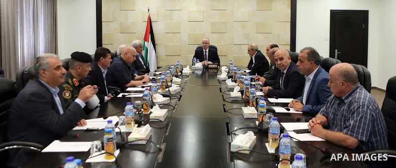 Palestinian Prime Minister Rami Hamdallah chairs a meeting with security chiefs, in the West Bank city of Ramallah on August 21, 2017. Photo by Prime Minister Office