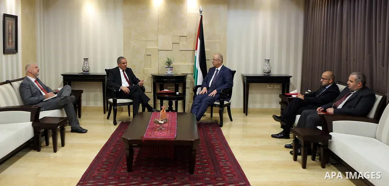 Palestinian Prime minister, Rami Hamdallah, meets with EU representative to Palestine Ralph Trav, in the West Bank city of Ramallah, on August 23, 2017. Photo by Prime Minister Office