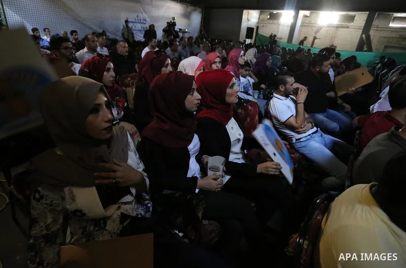 Palestinians attend the screening of "10 Years" at Samer Cinema in Gaza City on August 26, 2017. The Samer Cinema in Gaza City, the oldest in the strip and was built in 1944 but closed for decades, hosted a special scree...
