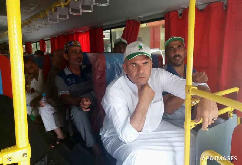 Palestinian Muslim pilgrims sit in a bus, during the annual hajj pilgrimage in Mecca August 27, 2017. According to the Muslims holy book the Koran, the Kaaba was built by Abraham and his son Ismael, after Ismael had sett...