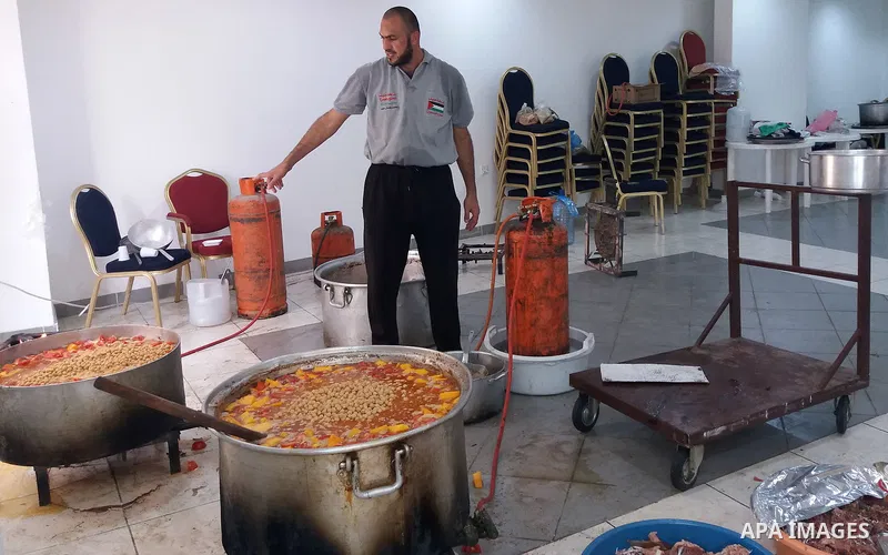Palestinian Muslim pilgrims cook a traditional dish of Couscous for pilgrims during the annual hajj pilgrimage in Mecca August 28, 2017. According to the Muslims holy book the Koran, the Kaaba was built by Abraham and hi...