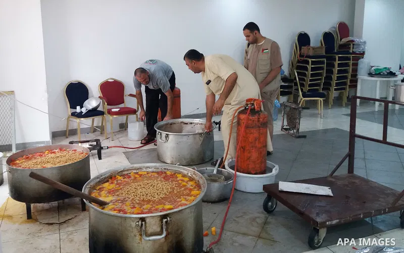 Palestinian Muslim pilgrims cook a traditional dish of Couscous for pilgrims during the annual hajj pilgrimage in Mecca August 28, 2017. According to the Muslims holy book the Koran, the Kaaba was built by Abraham and hi...