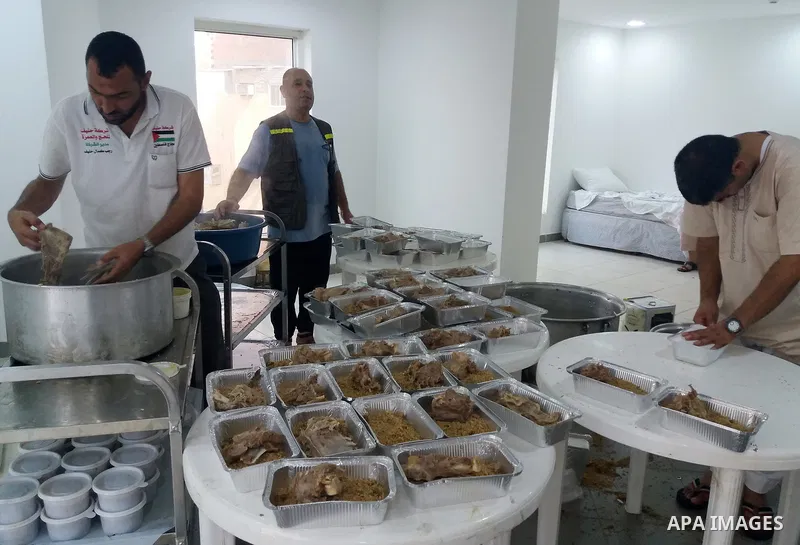 Palestinian Muslim pilgrims cook a traditional dish of rice and meat for pilgrims during the annual hajj pilgrimage in Mecca August 28, 2017. According to the Muslims holy book the Koran, the Kaaba was built by Abraham a...