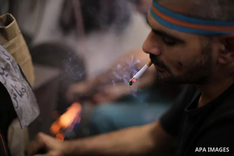 A Palestinian man sharpen knives at his workshop in Gaza city on August 29, 2017. The knives use to slaughter cattle and sheep for the Muslim holiday of Eid al-Adha or the Feast of Sacrifice, which marks the end of the a...