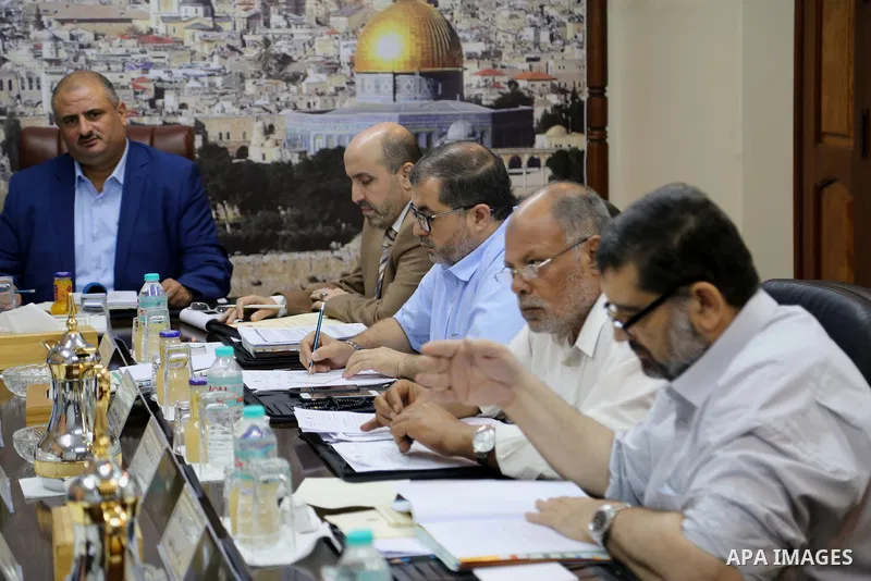 The Chairman of the Administrative Committee in Gaza strip Abdul Salam Siam, chairs a meeting for Administrative Committee, in Gaza city on August 29, 2017. Photo by Atia Darwish