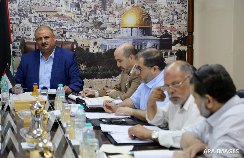 The Chairman of the Administrative Committee in Gaza strip Abdul Salam Siam, chairs a meeting for Administrative Committee, in Gaza city on August 29, 2017. Photo by Atia Darwish