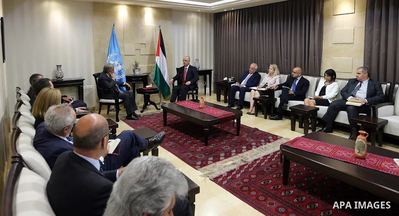Palestinian Prime Minister Rami Hamdallah meets with United Nations Secretary-General Antonio Guterres, in the West Bank city of Ramallah, on August 29, 2017. Photo by Prime Minister Office