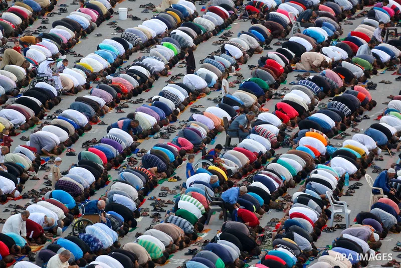 Palestinian muslims pray on the first day of Eid al-Adha, or feast of the sacrifice, in Nuseirat in the center of Gaza strip, on September 1, 2017. Muslims around the world are celebrating Eid al-Adha, the "Feast of Sacr...