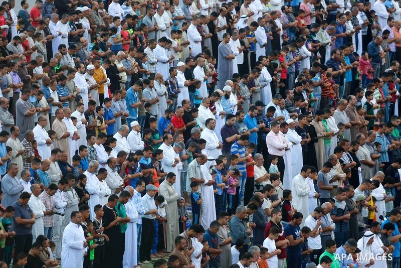 Palestinian muslims pray on the first day of Eid al-Adha, or feast of the sacrifice, in Nuseirat in the center of Gaza strip, on September 1, 2017. Muslims around the world are celebrating Eid al-Adha, the "Feast of Sacr...
