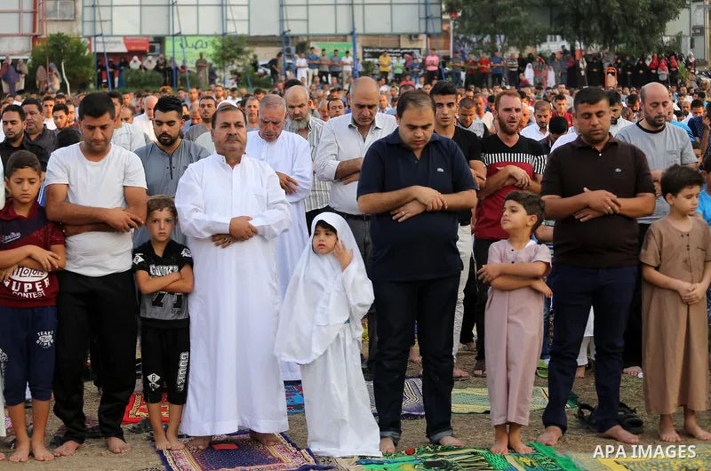 Palestinian muslims pray on the first day of of Eid al-Adha or the feast of sacrifice in Gaza city, on September 1, 2017. Muslims around the world are celebrating Eid al-Adha, the "Feast of Sacrifice", which marks the en...