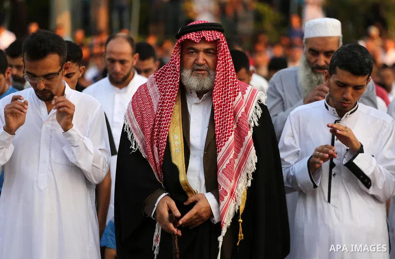 Palestinian muslims pray on the first day of of Eid al-Adha or the feast of sacrifice in Gaza city, on September 1, 2017. Muslims around the world are celebrating Eid al-Adha, the "Feast of Sacrifice", which marks the en...