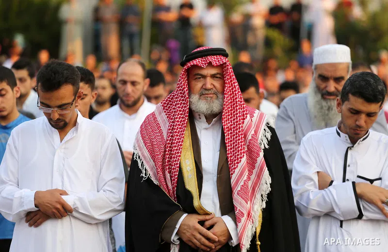 Palestinian muslims pray on the first day of of Eid al-Adha or the feast of sacrifice in Gaza city, on September 1, 2017. Muslims around the world are celebrating Eid al-Adha, the "Feast of Sacrifice", which marks the en...