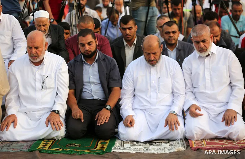 Palestinian muslims pray on the first day of of Eid al-Adha or the feast of sacrifice in Gaza city, on September 1, 2017. Muslims around the world are celebrating Eid al-Adha, the "Feast of Sacrifice", which marks the en...