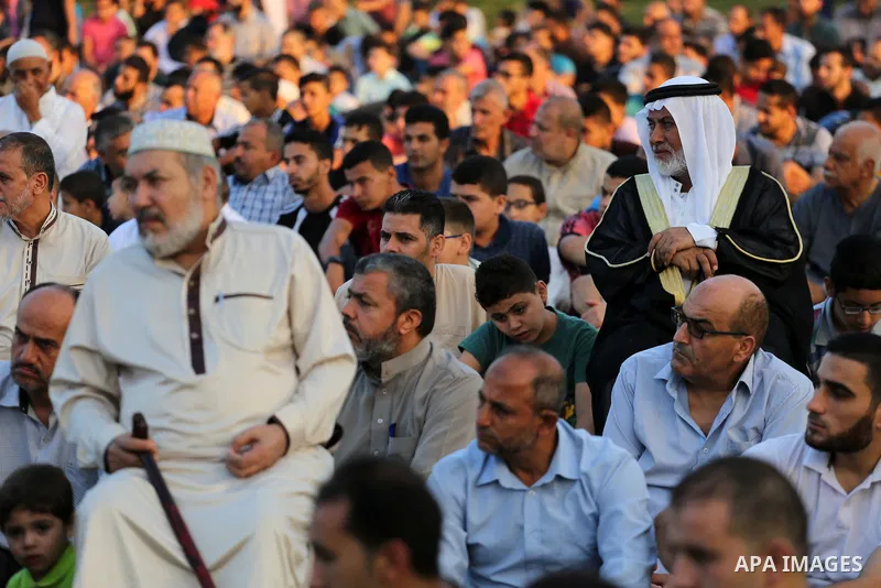 Palestinian muslims pray on the first day of of Eid al-Adha or the feast of sacrifice in Gaza city, on September 1, 2017. Muslims around the world are celebrating Eid al-Adha, the "Feast of Sacrifice", which marks the en...