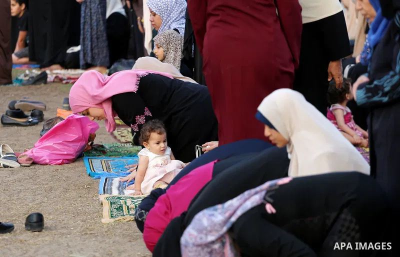 Palestinian muslims pray on the first day of of Eid al-Adha or the feast of sacrifice in Gaza city, on September 1, 2017. Muslims around the world are celebrating Eid al-Adha, the "Feast of Sacrifice", which marks the en...