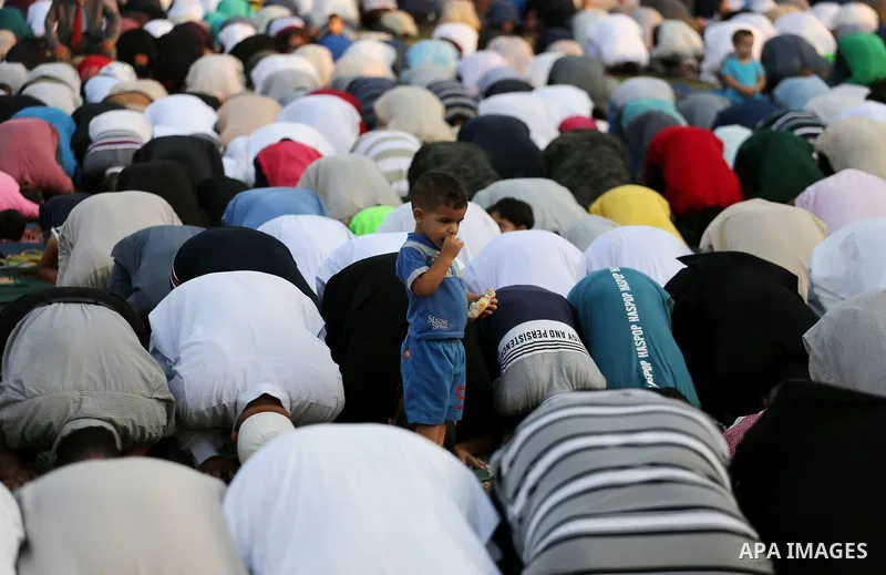 Palestinian muslims pray on the first day of of Eid al-Adha or the feast of sacrifice in Gaza city, on September 1, 2017. Muslims around the world are celebrating Eid al-Adha, the "Feast of Sacrifice", which marks the en...