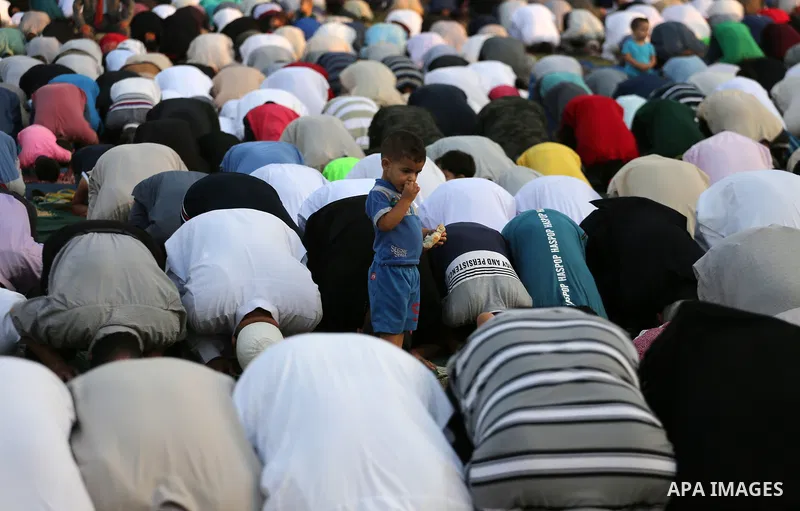 Palestinian muslims pray on the first day of of Eid al-Adha or the feast of sacrifice in Gaza city, on September 1, 2017. Muslims around the world are celebrating Eid al-Adha, the "Feast of Sacrifice", which marks the en...