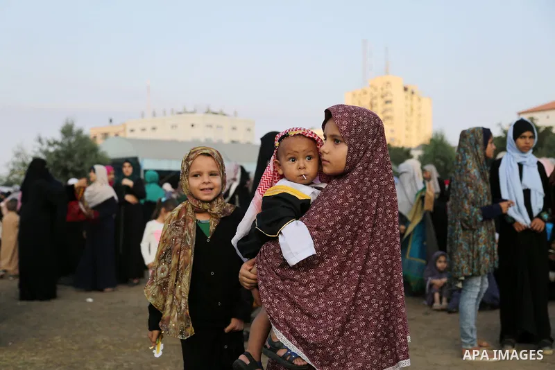 Palestinian muslims attend the prayer of Eid al-Adha or the feast of sacrifice in Gaza city, on September 1, 2017. Muslims around the world are celebrating Eid al-Adha, the "Feast of Sacrifice", which marks the end of th...
