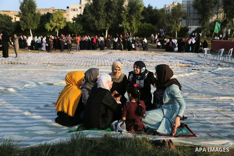 Palestinian muslims attend the prayer of Eid al-Adha or the feast of sacrifice in Gaza city, on September 1, 2017. Muslims around the world are celebrating Eid al-Adha, the "Feast of Sacrifice", which marks the end of th...